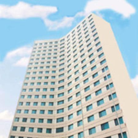 Overseas Chinese International Hotel 青島市 エクステリア 写真