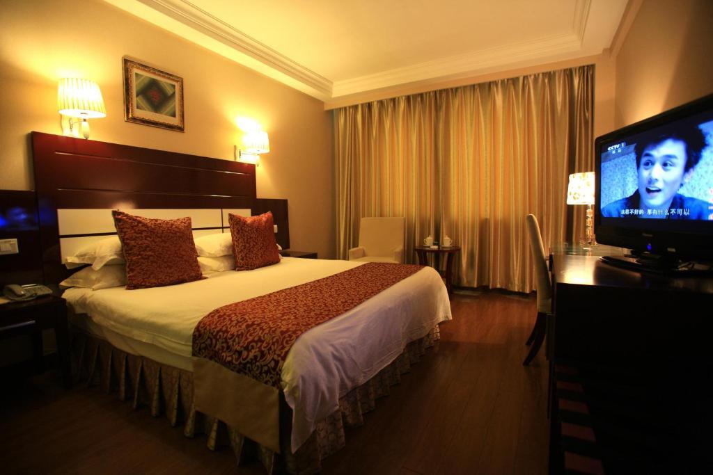 Overseas Chinese International Hotel 青島市 部屋 写真