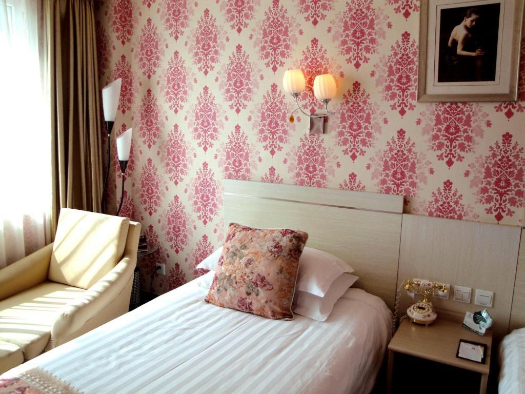 Overseas Chinese International Hotel 青島市 部屋 写真