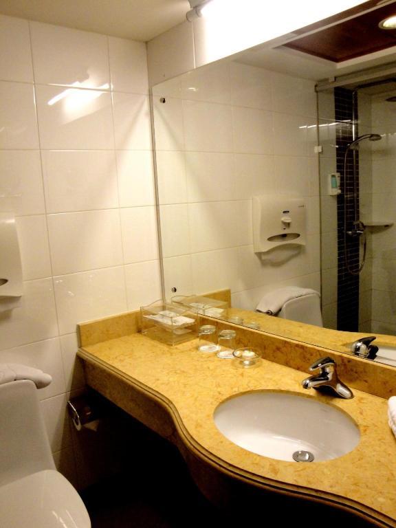 Overseas Chinese International Hotel 青島市 部屋 写真
