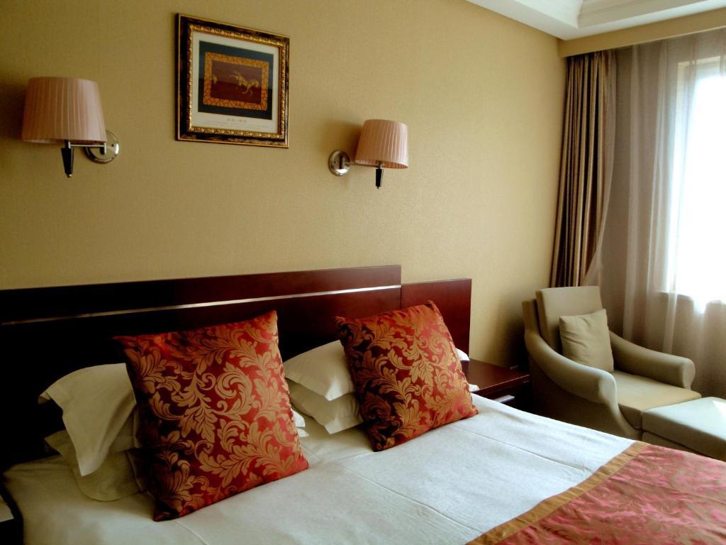 Overseas Chinese International Hotel 青島市 部屋 写真